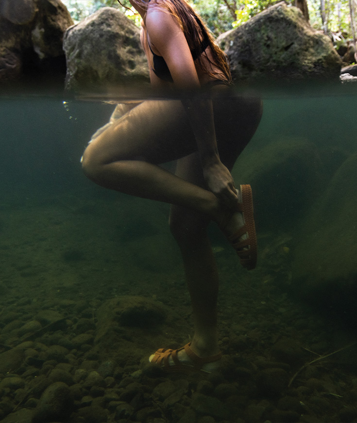 http://Underwater%20photo%20of%20woman%20wearing%20sandals